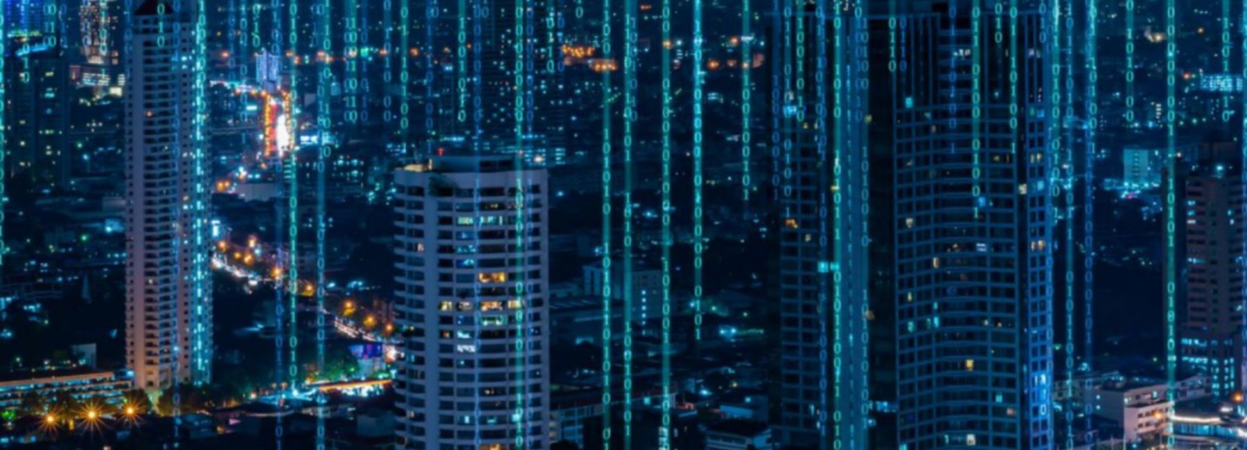 cityscape in the evening, with binary code, Cloud & Infrastructure | DXC Technology Insights